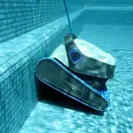 Dolphin S300 robotic pool cleaner front view|Dolphin S300 scrubbing brushes close-up|Dolphin S300 top-load filter access|Dolphin S300 cleaning pool waterline|Dolphin S300 MyDolphin Plus app spot cleaning|Dolphin S300 navigating pool wall