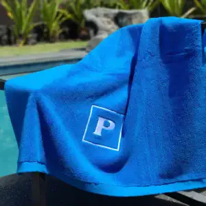 FatTowels super plush terry towel poolside|FatTowels plush terry towel lifestyle detail|FatTowels white plush terry towel half-fold