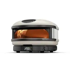 Gozney Arc propane outdoor pizza oven front view|Gozney Arc pizza oven in olive color|Gozney Arc oven cooking surface detail|Gozney Arc pizza oven alternate color option|Gozney Arc oven rear view showing burner|Gozney Arc pizza oven side profile