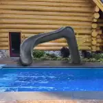 Global Pool Products Sidewinder deck mounted pool slide|Sidewinder pool slide front angle|Sidewinder slide side view|Sidewinder pool slide rear view|Sidewinder slide lifestyle backyard installation|Sidewinder slide ladder detail|Sidewinder pool slide assembly top view|Sidewinder slide flume detail|Sidewinder pool slide bottom angle
