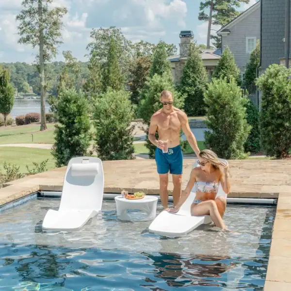 Tenjam Laylo in-pool lounger on backyard sun shelf|Tenjam Laylo lounger in pool overhead view|Tenjam Laylo lounger on beach entry pool|Tenjam Laylo depth chart no risers|Tenjam Laylo depth chart with 4 inch risers