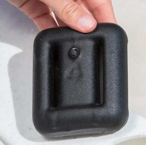 Tenjam coated lead weight for in-pool furniture|Tenjam weight being inserted into Laylo leg rest|Tenjam weight being inserted into Laylo backrest