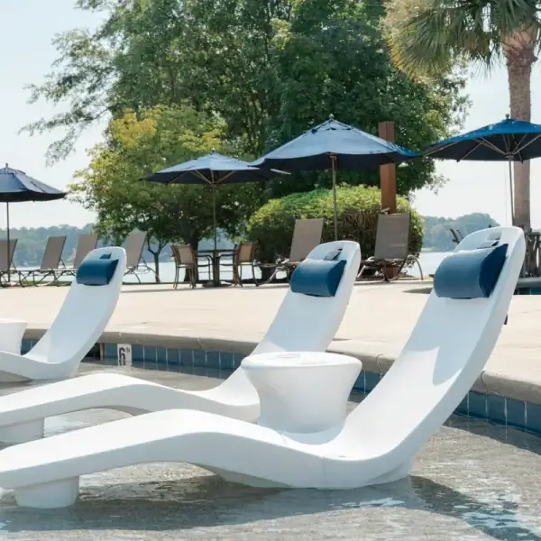 Tenjam pillow on Laylo loungers with navy blue color poolside|Tenjam Shayz pillow in aqua close-up