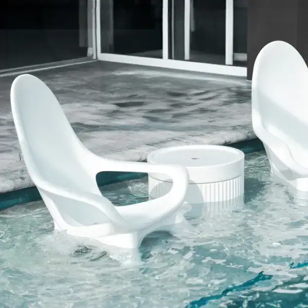 Tenjam Woosah in-pool chair pair in pool|Tenjam Woosah chair splash lifestyle|Tenjam Woosah chairs overhead view in pool|Tenjam Woosah chairs on patio|Tenjam Woosah chair detail view|Tenjam Woosah chair side profile|Tenjam Woosah chair beach entry setting