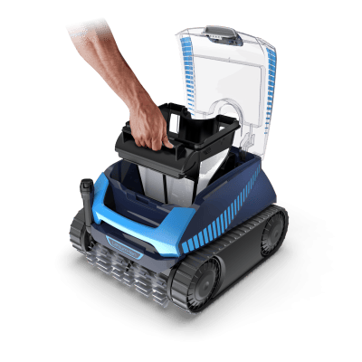 A hand lifts the filter basket from a Polaris FREEDOM™ Plus Cordless pool cleaner in Long Island, NY.