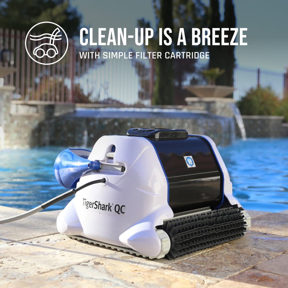 TigerShark QC robotic pool cleaner rests beside a blue pool with the text, "CLEAN-UP IS A BREEZE.