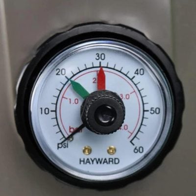 A Hayward pool pressure gauge displays a reading of 30 psi, featuring clear green and red indicator zones.