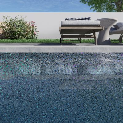 A close-up of Midnight Opal, a NY pool with lounge chairs and towels beside it in Long Island.