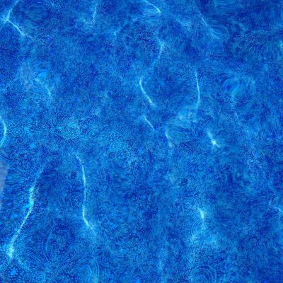 Starlight Swirl: sparkling blue pool water with ripples, perfect for pool supplies in Long Island, NY.