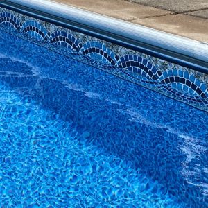 A close-up of Sanibel Tile from Highland Beach Floor, perfect for stylish pool areas in Long Island homes.