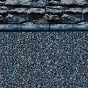 An Atlantic Stone or Sea Slate wall sits above matching gravel, ideal for pool supplies in Long Island.