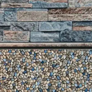 Eagle Beach Tile and Gold Coast Floor are displayed above smooth pebbles, perfect for NY pool projects.