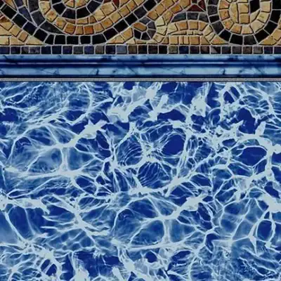 A decorative mosaic tile border lines a blue pool, featuring Sandy Cay Tile for NY pool supplies Long Island.