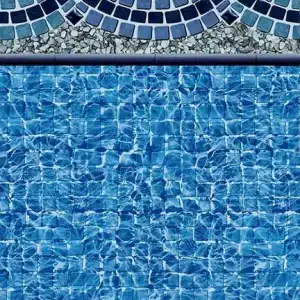 The Sanibel Tile Highland Beach Floor pool liner features a blue wave border, shown at a Long Island pool.