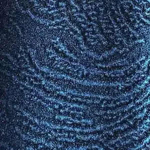 Close-up of the Shelter Cove All Over Pattern, showing a blue, glittery pool surface in Long Island.