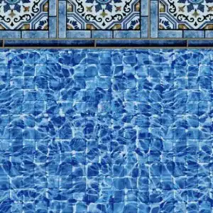 Thistle Bloom Tile and Highland Beach Floor form a mosaic border above the shimmering pool water.