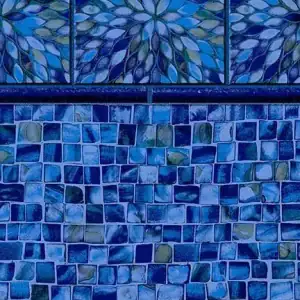Valencia Tile in Ocean Mist with a floral border enhances poolside floors in Long Island and Queens, NY.